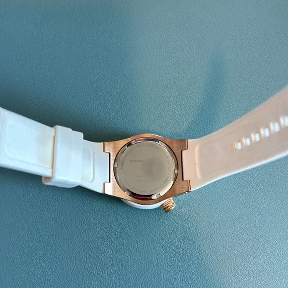 Swiss Legend, Neptune, white and rose gold watch. Has instruction manual.